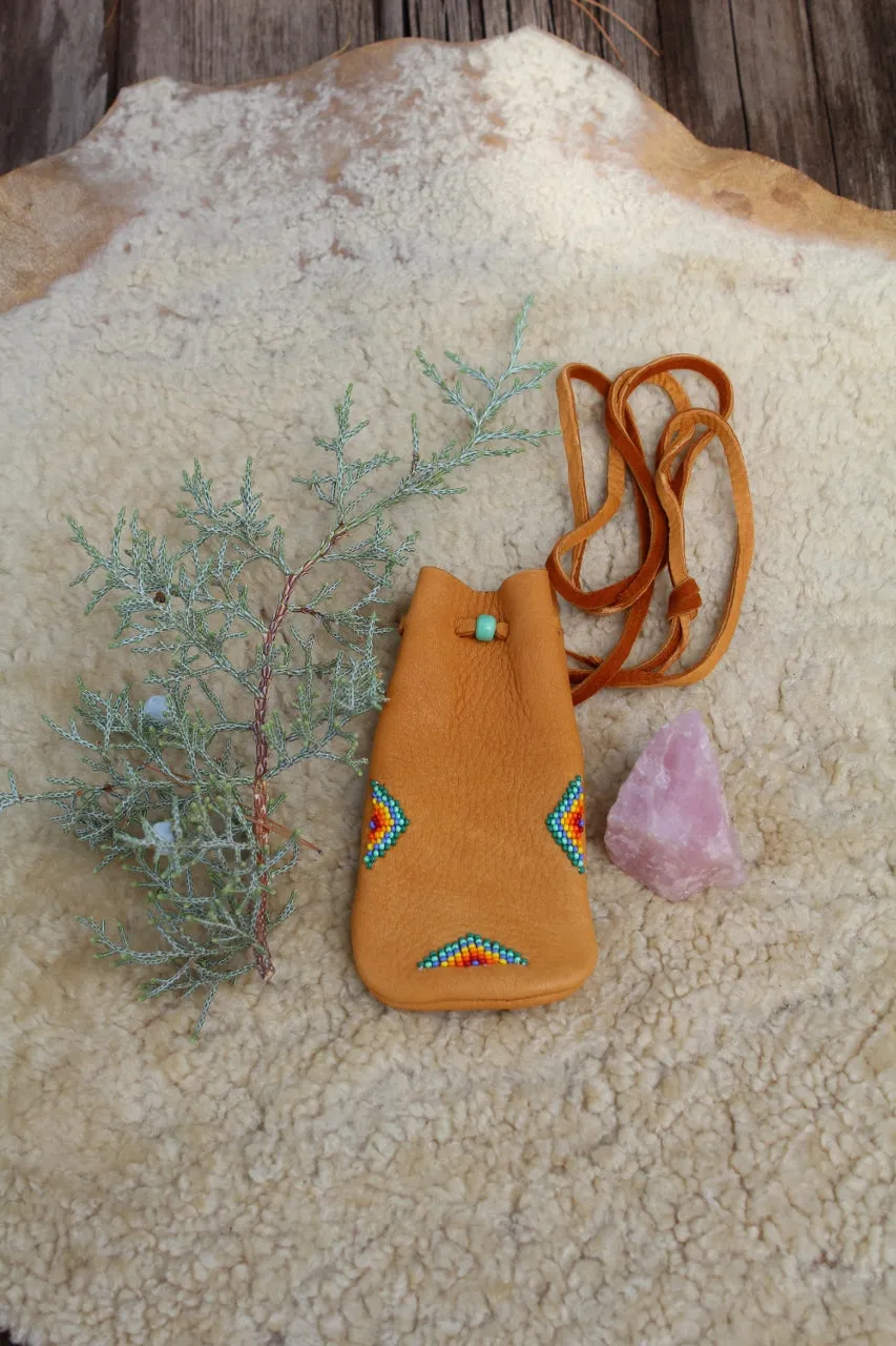 beaded leather pouch, crystal medicine bag