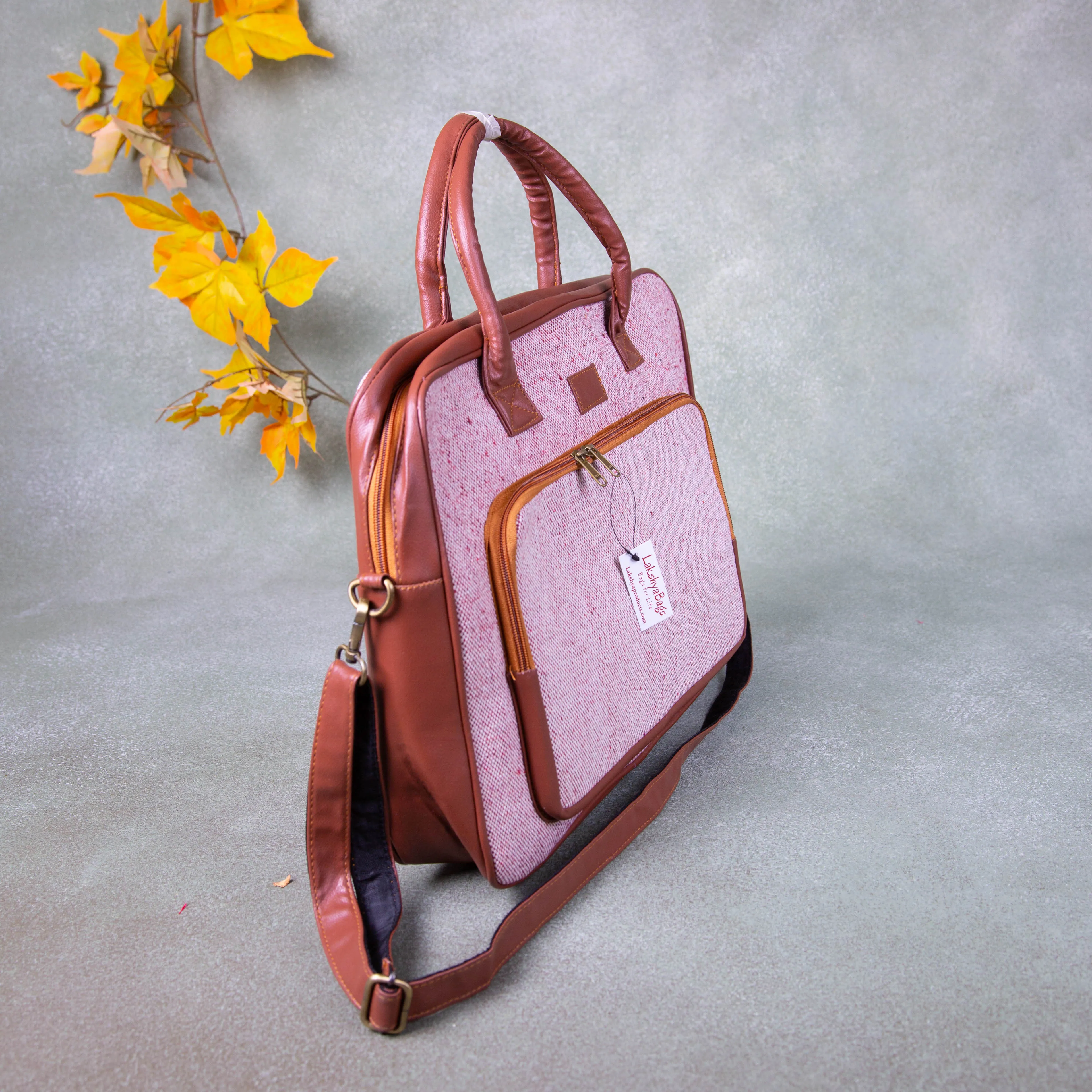 Unisex Laptop shoulder bags Brown with Pink Prints.